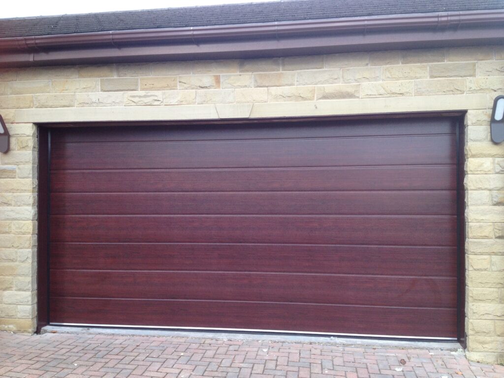 Rosewood laminate sectional garage door